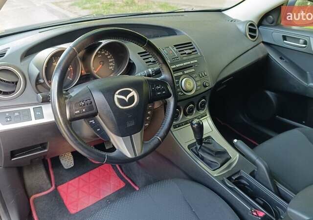 Мазда 3 2009 в Житомире на Automoto.ua Синий Мазда 3, объемом двигателя 1.6 л и пробегом 227 тыс. км за 5900 $, фото 10 на Automoto.ua