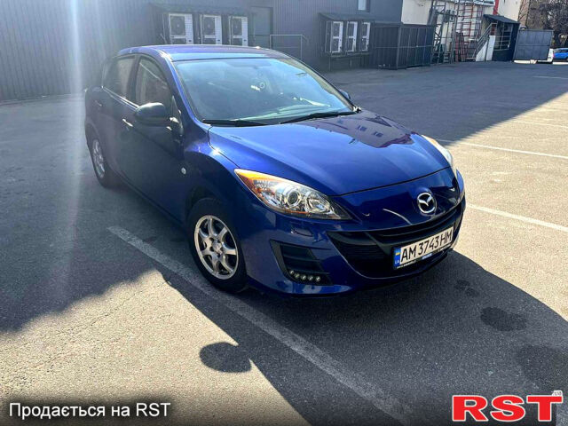 Синий Мазда 3, объемом двигателя 1.6 л и пробегом 147 тыс. км за 7500 $, фото 3 на Automoto.ua