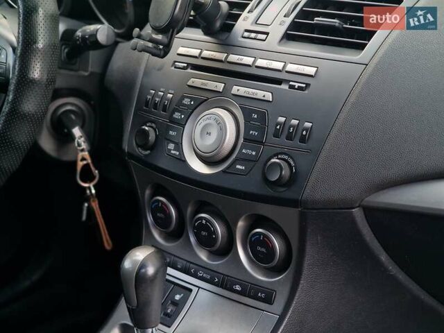 Синий Мазда 3, объемом двигателя 1.6 л и пробегом 188 тыс. км за 8990 $, фото 55 на Automoto.ua