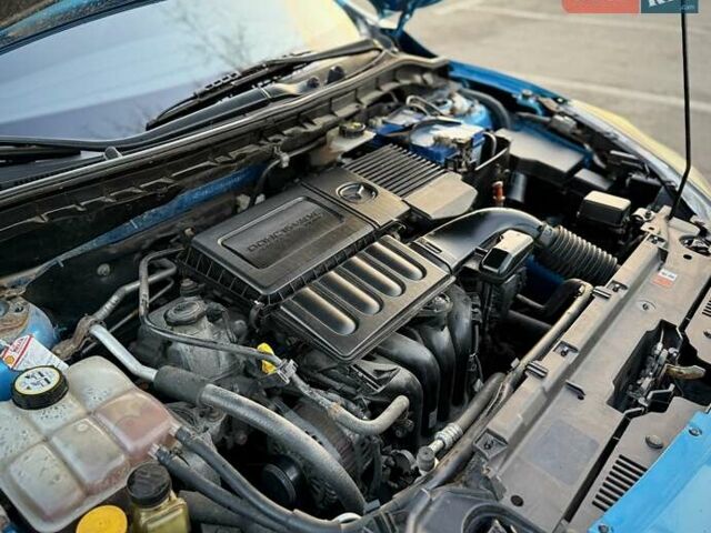 Синий Мазда 3, объемом двигателя 1.6 л и пробегом 226 тыс. км за 7999 $, фото 25 на Automoto.ua