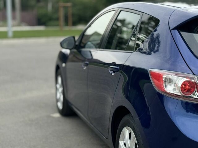 Синий Мазда 3, объемом двигателя 2 л и пробегом 232 тыс. км за 7999 $, фото 5 на Automoto.ua