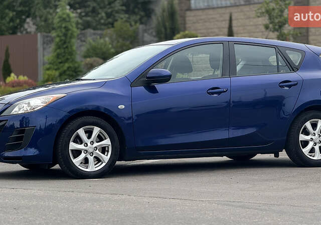 Синий Мазда 3, объемом двигателя 2 л и пробегом 230 тыс. км за 7700 $, фото 5 на Automoto.ua
