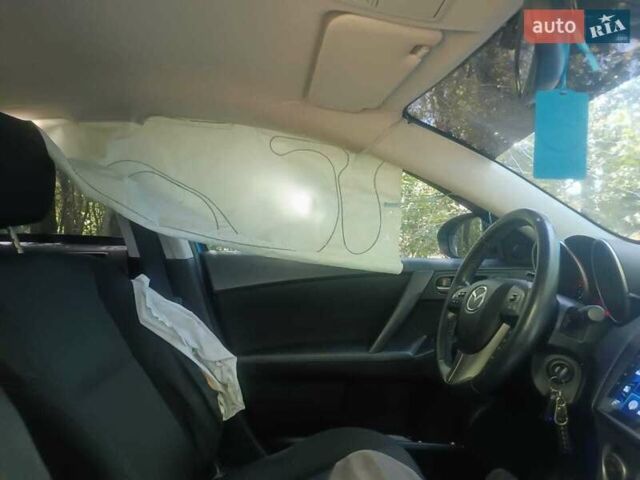 Синий Мазда 3, объемом двигателя 1.6 л и пробегом 148 тыс. км за 4300 $, фото 5 на Automoto.ua