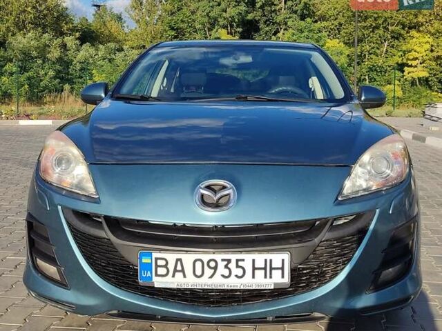 Синий Мазда 3, объемом двигателя 1.6 л и пробегом 150 тыс. км за 7500 $, фото 1 на Automoto.ua