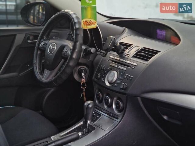 Синий Мазда 3, объемом двигателя 1.6 л и пробегом 188 тыс. км за 8990 $, фото 54 на Automoto.ua