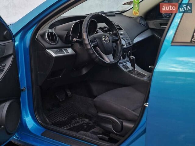 Синий Мазда 3, объемом двигателя 1.6 л и пробегом 188 тыс. км за 8990 $, фото 44 на Automoto.ua