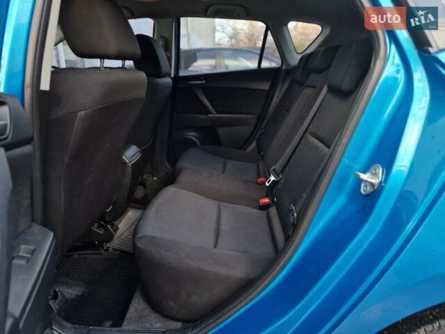 Синий Мазда 3, объемом двигателя 1.6 л и пробегом 188 тыс. км за 8990 $, фото 59 на Automoto.ua