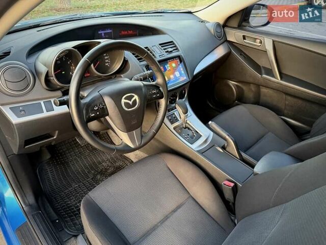 Синий Мазда 3, объемом двигателя 1.6 л и пробегом 226 тыс. км за 7999 $, фото 16 на Automoto.ua