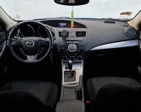 Синий Мазда 3, объемом двигателя 1.6 л и пробегом 188 тыс. км за 8990 $, фото 61 на Automoto.ua