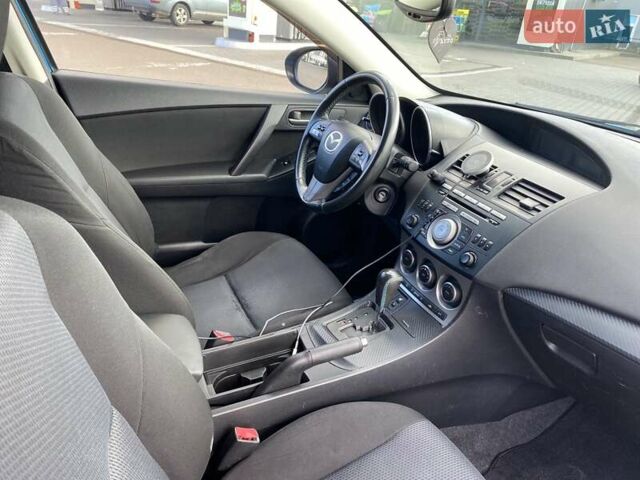 Синий Мазда 3, объемом двигателя 1.6 л и пробегом 195 тыс. км за 7200 $, фото 5 на Automoto.ua