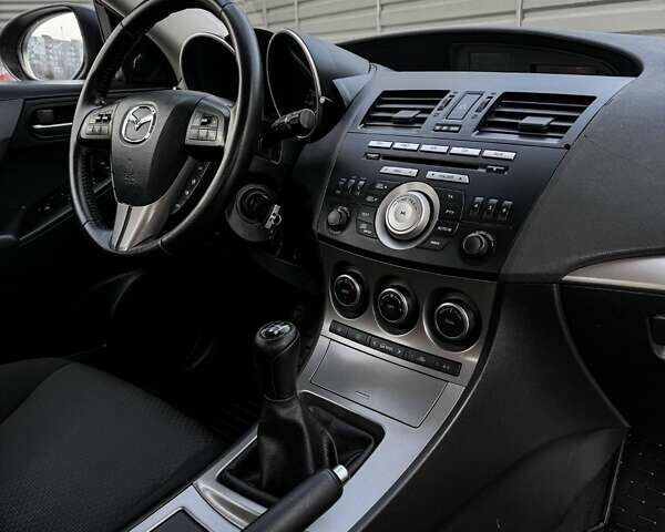 Синий Мазда 3, объемом двигателя 1.6 л и пробегом 166 тыс. км за 7999 $, фото 29 на Automoto.ua