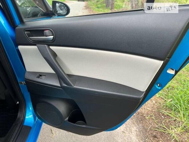 Синий Мазда 3, объемом двигателя 1.6 л и пробегом 142 тыс. км за 9800 $, фото 25 на Automoto.ua