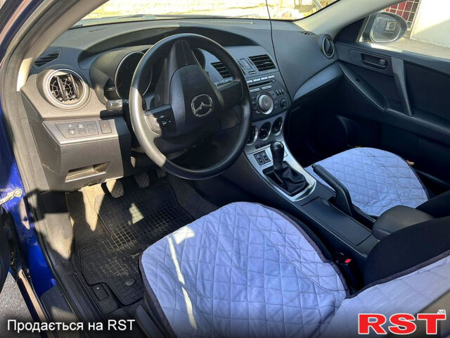 Синий Мазда 3, объемом двигателя 1.6 л и пробегом 147 тыс. км за 7500 $, фото 7 на Automoto.ua