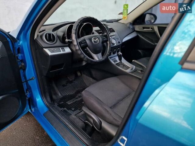 Синий Мазда 3, объемом двигателя 1.6 л и пробегом 188 тыс. км за 8990 $, фото 41 на Automoto.ua
