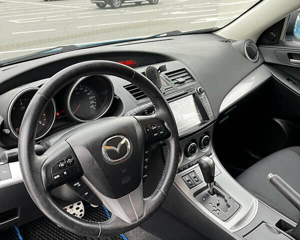 Синий Мазда 3, объемом двигателя 1.6 л и пробегом 208 тыс. км за 8500 $, фото 7 на Automoto.ua