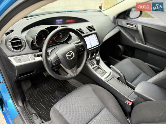 Синій Мазда 3, об'ємом двигуна 1.6 л та пробігом 226 тис. км за 7700 $, фото 10 на Automoto.ua