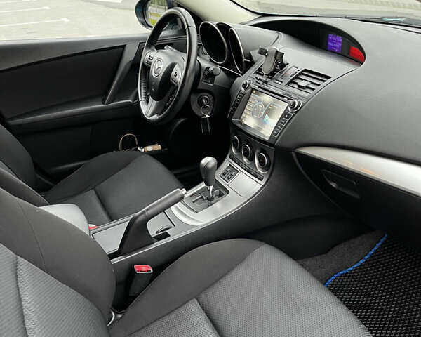 Синий Мазда 3, объемом двигателя 1.6 л и пробегом 208 тыс. км за 8500 $, фото 11 на Automoto.ua