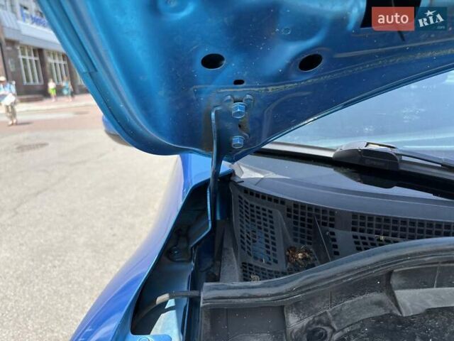 Синий Мазда 3, объемом двигателя 1.6 л и пробегом 216 тыс. км за 7000 $, фото 5 на Automoto.ua