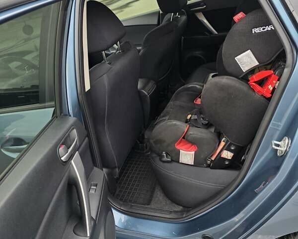 Мазда 3 2011 у Києві на Automoto.ua Синій Мазда 3, об'ємом двигуна 2.49 л та пробігом 130 тис. км за 8700 $, фото 11 на Automoto.ua