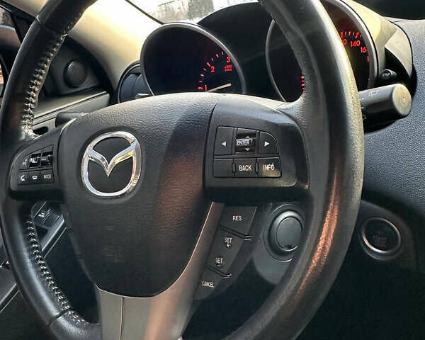 Синій Мазда 3, об'ємом двигуна 2.2 л та пробігом 190 тис. км за 7500 $, фото 14 на Automoto.ua