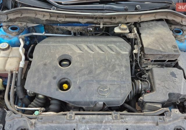 Синий Мазда 3, объемом двигателя 1.6 л и пробегом 223 тыс. км за 7800 $, фото 15 на Automoto.ua