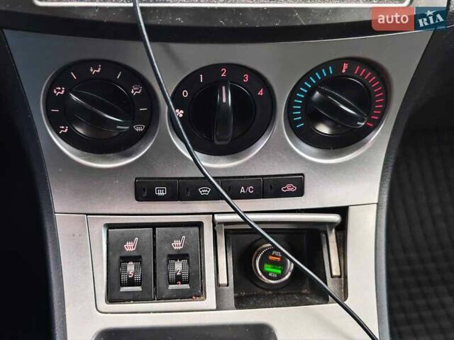 Синий Мазда 3, объемом двигателя 1.6 л и пробегом 181 тыс. км за 7990 $, фото 25 на Automoto.ua