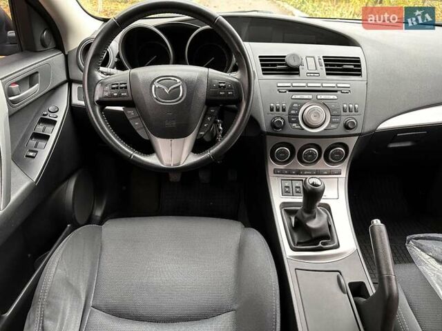Синий Мазда 3, объемом двигателя 1.6 л и пробегом 293 тыс. км за 6500 $, фото 17 на Automoto.ua