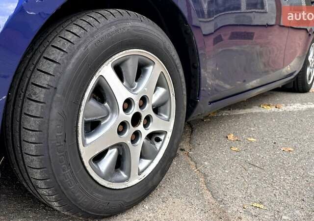 Синий Мазда 3, объемом двигателя 1.6 л и пробегом 293 тыс. км за 6500 $, фото 4 на Automoto.ua