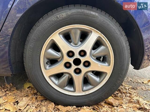 Синий Мазда 3, объемом двигателя 1.6 л и пробегом 293 тыс. км за 6500 $, фото 5 на Automoto.ua