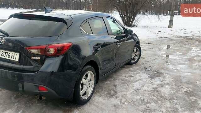 Синий Мазда 3, объемом двигателя 2.19 л и пробегом 235 тыс. км за 9100 $, фото 3 на Automoto.ua