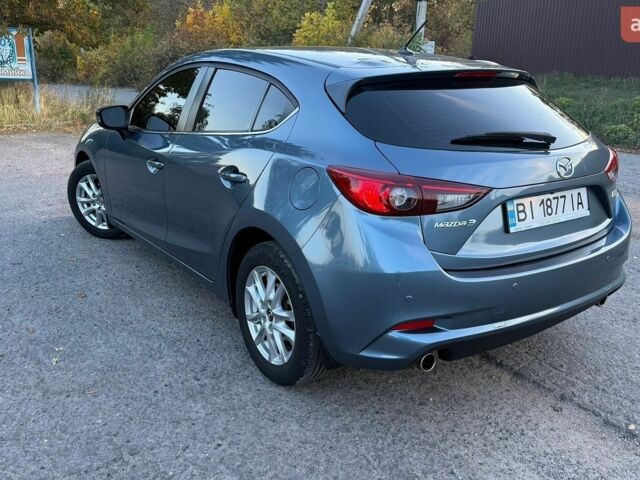 Синий Мазда 3, объемом двигателя 2 л и пробегом 138 тыс. км за 12200 $, фото 4 на Automoto.ua