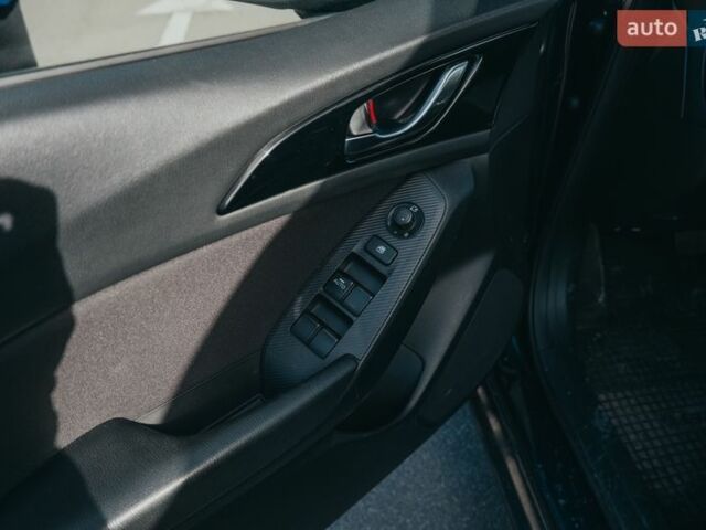 Синий Мазда 3, объемом двигателя 1.5 л и пробегом 128 тыс. км за 12000 $, фото 12 на Automoto.ua