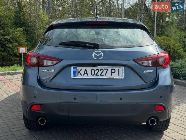 Синий Мазда 3, объемом двигателя 2 л и пробегом 106 тыс. км за 10990 $, фото 4 на Automoto.ua