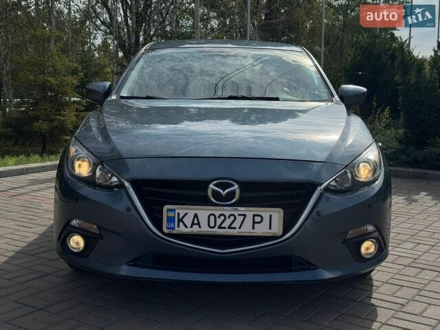 Синий Мазда 3, объемом двигателя 2 л и пробегом 106 тыс. км за 10300 $, фото 1 на Automoto.ua