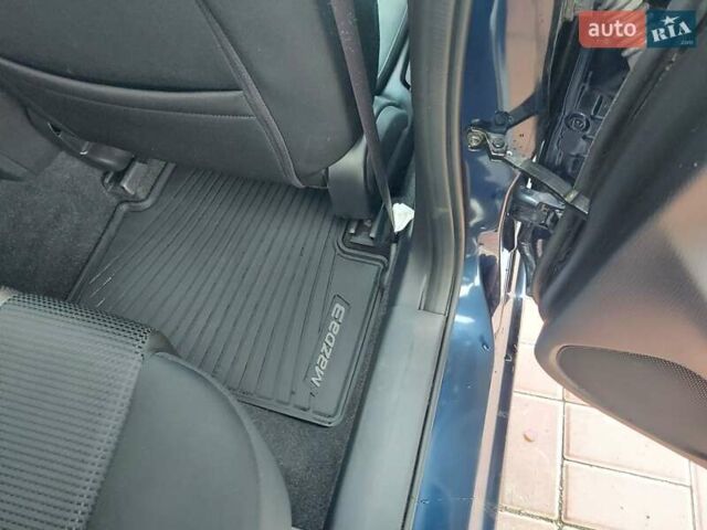 Синий Мазда 3, объемом двигателя 2.19 л и пробегом 200 тыс. км за 14500 $, фото 27 на Automoto.ua