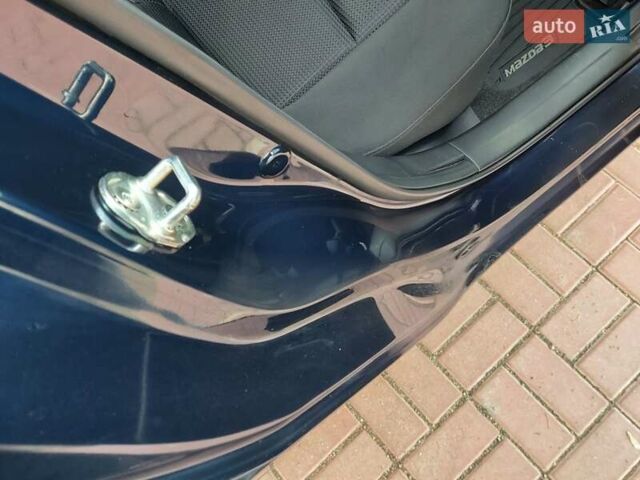 Синий Мазда 3, объемом двигателя 2.19 л и пробегом 200 тыс. км за 14500 $, фото 31 на Automoto.ua