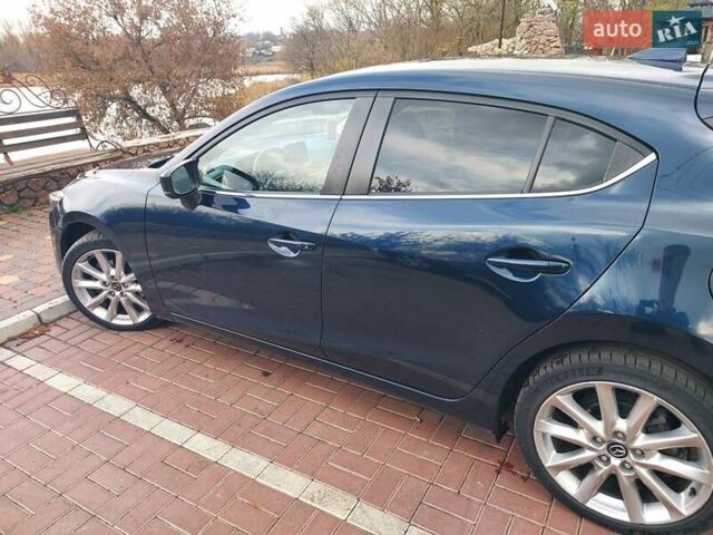 Синий Мазда 3, объемом двигателя 2.19 л и пробегом 200 тыс. км за 14500 $, фото 8 на Automoto.ua