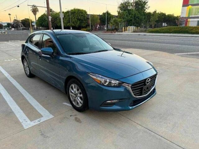 Синий Мазда 3, объемом двигателя 2.5 л и пробегом 95 тыс. км за 2350 $, фото 5 на Automoto.ua