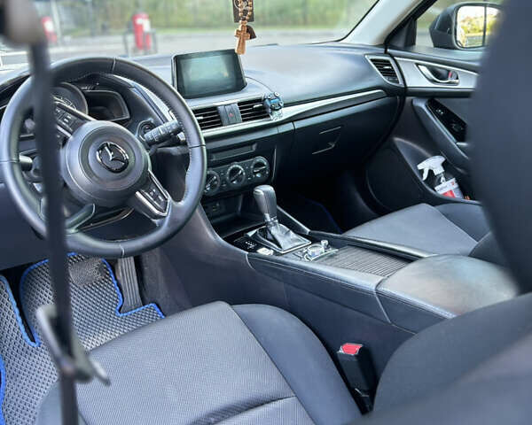 Синий Мазда 3, объемом двигателя 2 л и пробегом 205 тыс. км за 10750 $, фото 5 на Automoto.ua