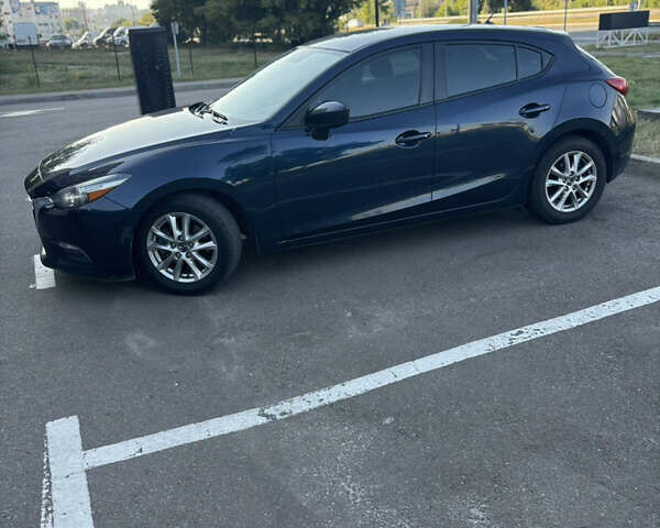 Синий Мазда 3, объемом двигателя 2 л и пробегом 205 тыс. км за 10750 $, фото 4 на Automoto.ua
