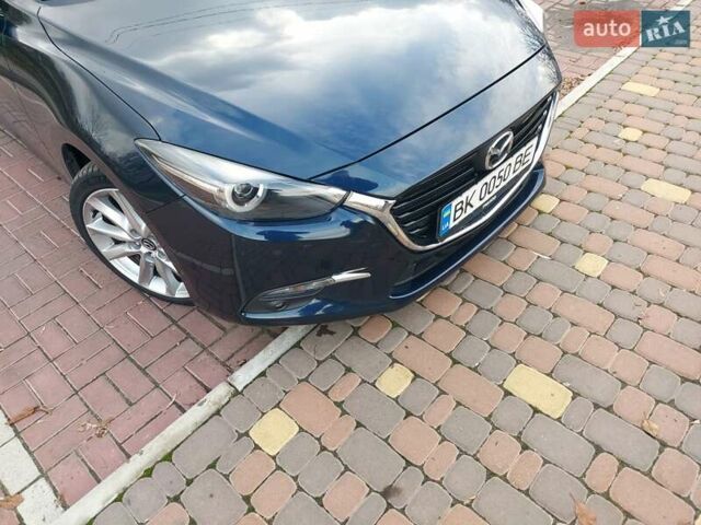 Синий Мазда 3, объемом двигателя 2.19 л и пробегом 200 тыс. км за 14500 $, фото 19 на Automoto.ua