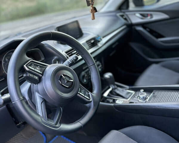 Синий Мазда 3, объемом двигателя 2 л и пробегом 205 тыс. км за 10750 $, фото 6 на Automoto.ua