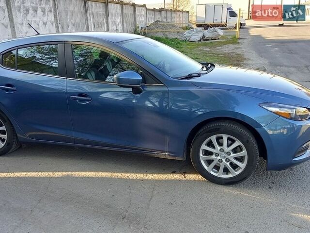 Синий Мазда 3, объемом двигателя 2 л и пробегом 228 тыс. км за 12000 $, фото 2 на Automoto.ua