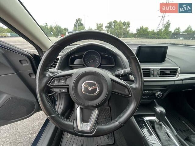 Синий Мазда 3, объемом двигателя 1.5 л и пробегом 94 тыс. км за 16000 $, фото 27 на Automoto.ua
