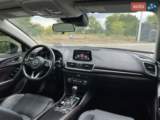 Синий Мазда 3, объемом двигателя 2.49 л и пробегом 135 тыс. км за 14100 $, фото 27 на Automoto.ua