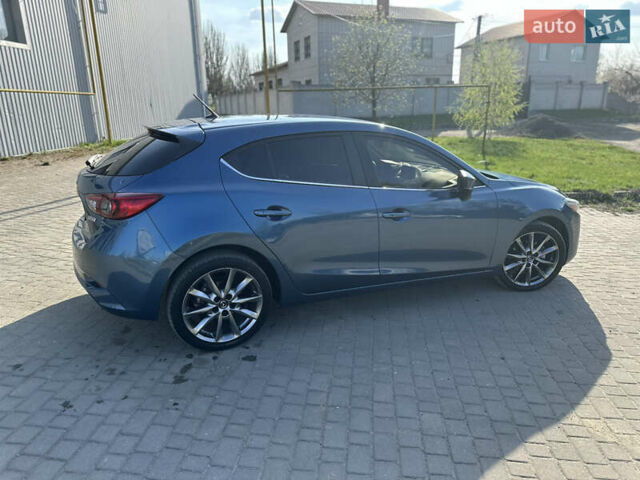 Синій Мазда 3, об'ємом двигуна 2.49 л та пробігом 65 тис. км за 13900 $, фото 15 на Automoto.ua