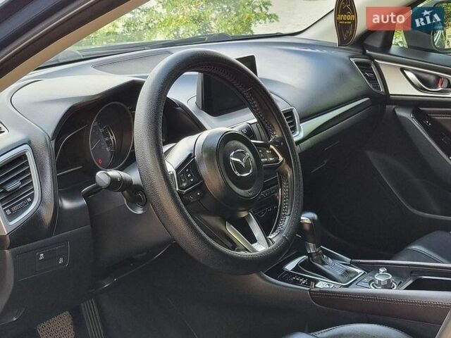 Синий Мазда 3, объемом двигателя 2.5 л и пробегом 74 тыс. км за 13000 $, фото 11 на Automoto.ua