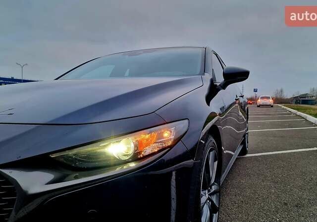 Синий Мазда 3, объемом двигателя 2.49 л и пробегом 49 тыс. км за 16700 $, фото 1 на Automoto.ua