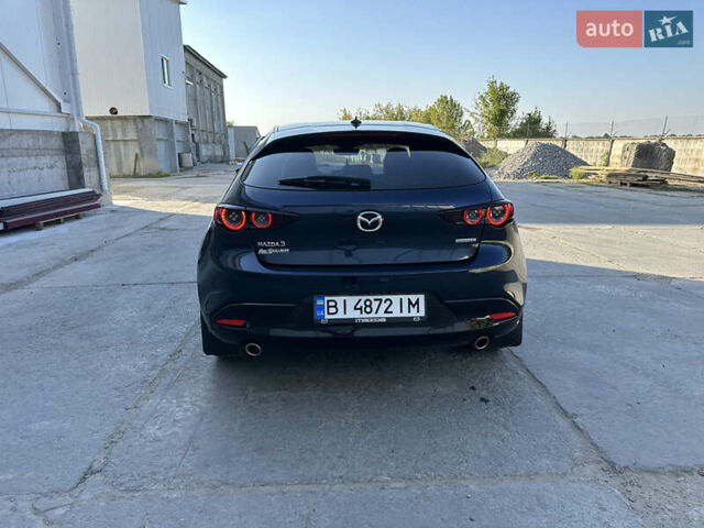 Синий Мазда 3, объемом двигателя 2.49 л и пробегом 99 тыс. км за 15400 $, фото 6 на Automoto.ua