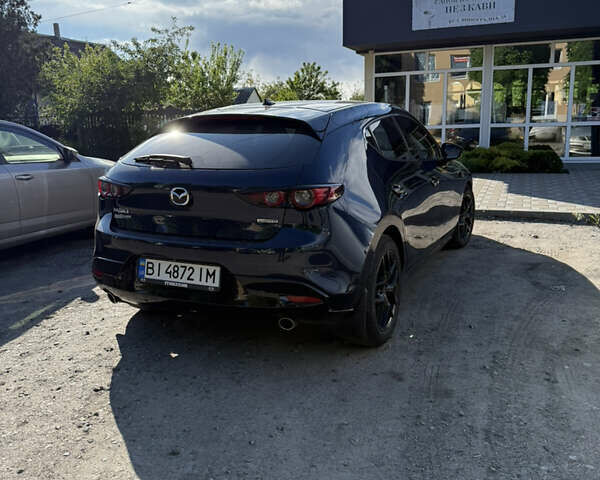 Синий Мазда 3, объемом двигателя 2.49 л и пробегом 99 тыс. км за 15400 $, фото 1 на Automoto.ua